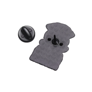 Reverse side of cute frog mushroom alloy brooch with black rubber back and honeycomb texture