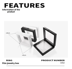 Detailed view of black and white floating jewelry boxes with elastic PE film for rings