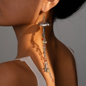 Detail of long jellyfish earrings with colored glass beads and starfish charm