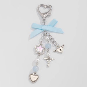 Silver keychain with light blue ribbon bow, glittering star and heart lock pendants