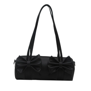 Elegant black cylindrical Boston handbag with stylish bow details and smooth leather finish