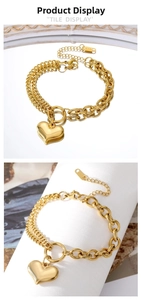 Detailed shot of gold heart pendant with asymmetrical chain and K18 hallmark engraving