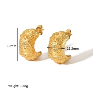 Retro 18K gold C-shaped earrings featuring sun moon and star motifs with cubic zirconia