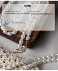 Detail of freshwater pearl necklace with gold heart pendant and OT toggle clasp closure