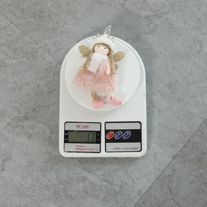 Detailed scale view showing the 13g lightweight pink plush angel doll ornament