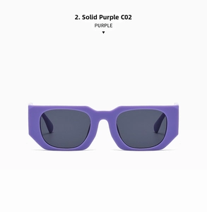 Close-up of solid purple rectangular sunglasses with thick frame and metal hinges
