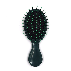 Deep green air cushion hair massage brush with round handle and soft massage pins