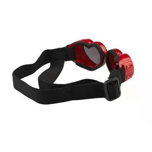 Detail of red heart pet goggles featuring adjustable elastic strap and sponge padding