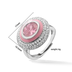 Detail view of pink oval crystal ring with enamel inlay and 19.5mm x 17mm dimensions