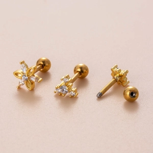 Three gold stainless steel cartilage earrings with flower and droplet zircon designs