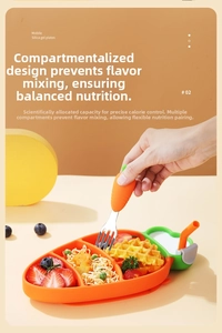 Carrot-shaped silicone suction plate with dividers and a matching fork for baby self-feeding