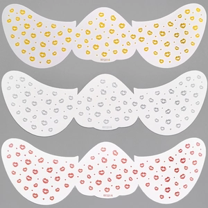 Detailed view of K92014 wing-shaped gold, silver and red lip freckle tattoo stickers