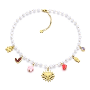 Stainless steel pearl necklace with gold heart, flower, and bear charms on white background