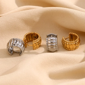 Vintage 18K gold and silver plated stainless steel hoop earrings with textured wave design