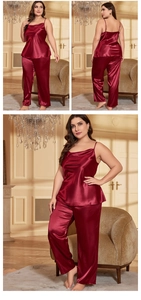 Detail view of burgundy satin pajama set featuring camisole top and wide-leg trousers