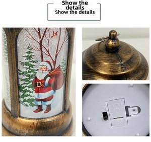 Detail view of vintage bronze Christmas lantern showing Santa Claus print and battery base