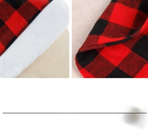 Close-up of red and black buffalo plaid fabric with soft white plush trim detail