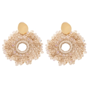 Close-up of handmade Bohemian woven stud earrings with rainbow beads and gold oval studs