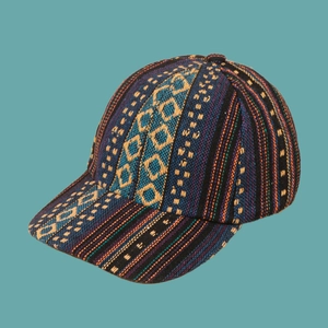 Macro detail of ethnic style woven baseball cap with colorful geometric pattern