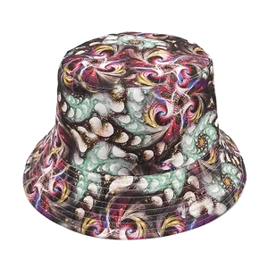 Detailed view of colorful fractal print and stitching on double-sided bucket hat