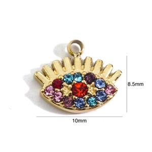 Detail view of gold eye-shaped pendant with colorful rhinestones and 8.5x10mm size markings
