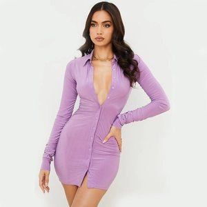 Detailed close-up of purple long sleeve button-down dress with side ruching and slim fit