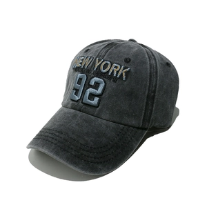 Detail view of New York 92 3D embroidery on vintage washed grey baseball cap