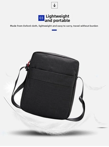 Close-up of lightweight black Oxford fabric shoulder bag with red zipper detail