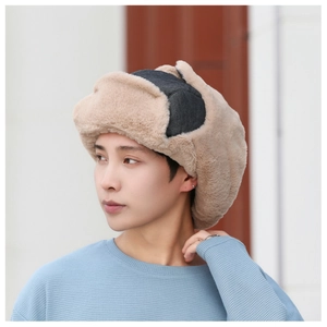 Close-up of winter trapper hat showing fluffy faux fur lining and warm ear flaps