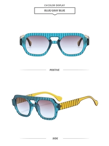 Detail view of retro square sunglasses with blue striped frame and bright yellow temples
