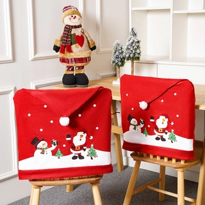 Christmas non-woven chair covers with festive Santa and Snowman prints in red