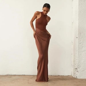 Detail of a brown sleeveless knit bodice and satin splicing on a fishtail dress