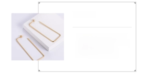 Detailed view of large rectangular 316 titanium steel earrings with 18K gold plating