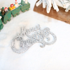 Glitter silver Merry Christmas sign ornament for tree decoration on snowy background