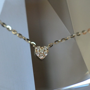 925 silver heart necklace with pavé cubic zirconia and 14k gold plating on an O-chain