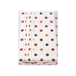 Colorful star pattern wrapping paper stacked flat for creative birthday gift packaging