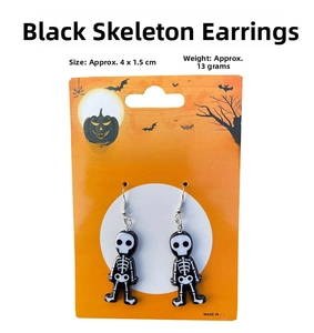 Detail view of black human skeleton earrings for Halloween party with 4x1.5cm dimensions