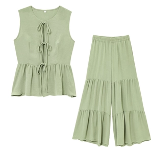 Sage green two-piece women's set with tie-front sleeveless top and tiered wide-leg pants