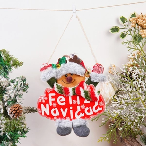 Detail of hanging gingerbread man ornament with Feliz Navidad sign and mini gold bell
