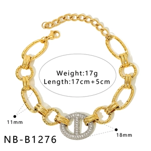 Detail showing weight and dimensions of the gold and silver stainless steel heart bracelet