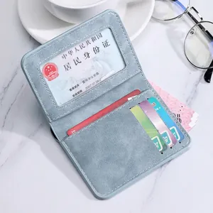 Slim light blue suede vertical card holder wallet with transparent ID window and slots