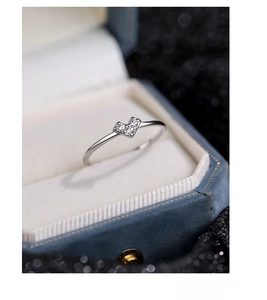 Macro shot of S925 sterling silver ring with micro-set heart-shaped zircon stones