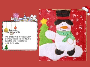 Close-up of Christmas felt gift bag featuring detailed snowman embroidery and white snowflakes