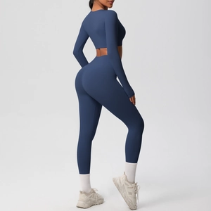 Detailed back view of navy blue seamless yoga set showing flexible fabric texture