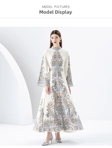Detail of vintage paisley print on long-sleeved dress with elegant stand collar design