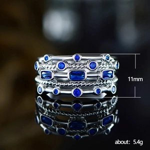 Elegant 11mm multi-layer sterling silver ring with green gemstones and zircon stones