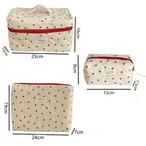 Three-piece quilted makeup bag set with red hearts and size specifications displayed