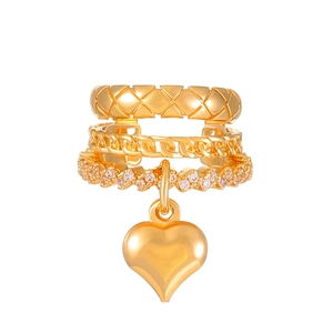 Three-layer gold ear cuff with quilting, chain links, crystals and heart pendant
