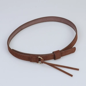 Slim brown faux suede braided belt with golden ring buckle and fringe tassel detail
