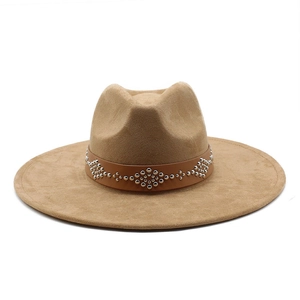 Detailed view of camel suede fedora featuring a vintage leather band with metal rivets